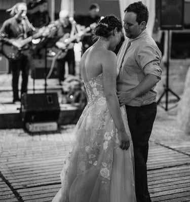 Bride and Groom Slow Dancing to A Live Band