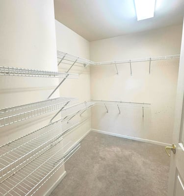 a closet with a closet space for clothes and other items