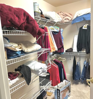 a closet with a closet space for clothes and other items