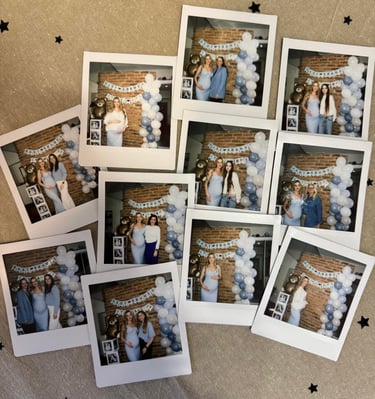 Polaroid photos from a baby shower showing guests by a blue balloon arch and teddy bear backdrop.
