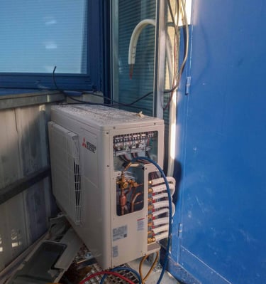 Installation of a Mitsubishi quadrisplit.