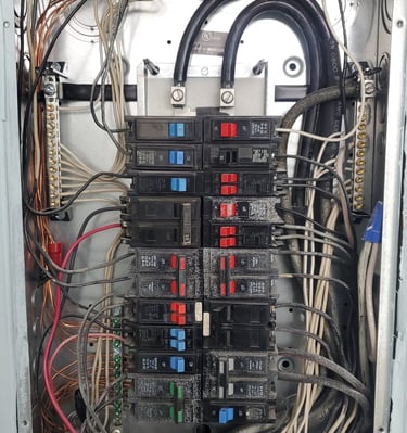 Older electrical panel in a 1970s condo. There were quite a few issues in that one!