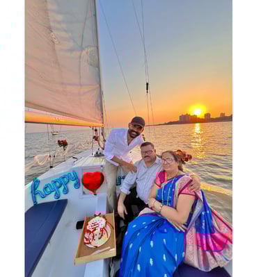a man and woman sitting on a boat