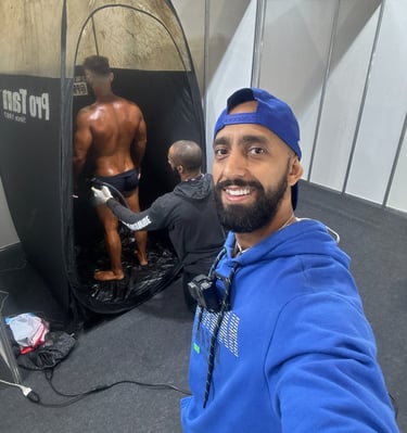 a man in a blue hoodie and a blue shirt