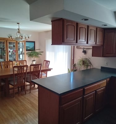 large kitchen counter peninsula and dining table