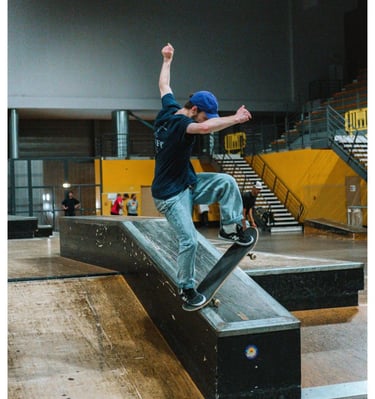 a man riding a skateboard on a ramp pomge Marseille France skatepark