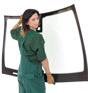 a woman in a green overall overall suit and gloves