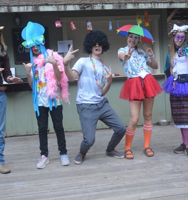 a group of people leaders in costumes for a dinner