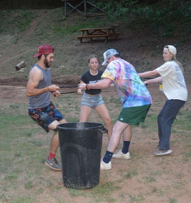 a group of people playing kajabi kan-kan