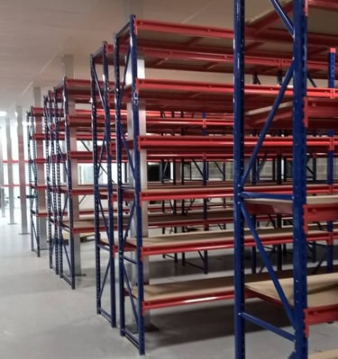 Longspan shelving with chipboard shelves