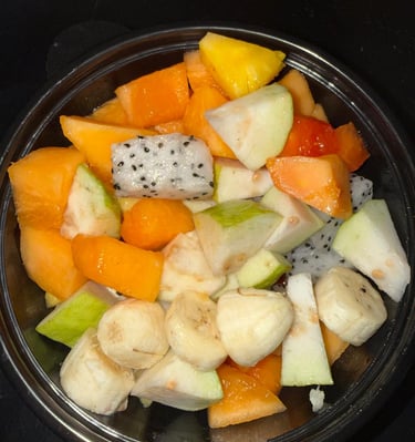 Fruit bowl with ice cream