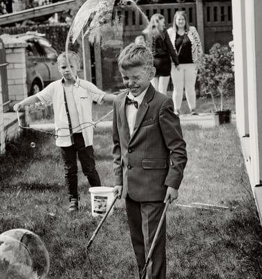 a man in a suit and tie is holding a cane cane and a cane cane