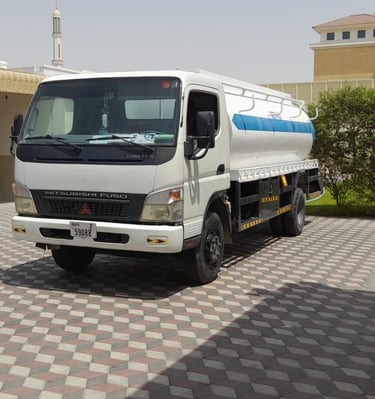 a water tanker standing on tiles floor