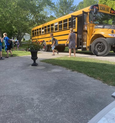 bus delivering kids to camp