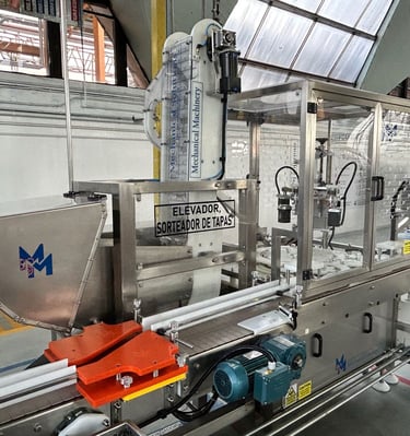 Elevador de tapa, elevador de tapa, orientador de tapa, alimentador de tapas