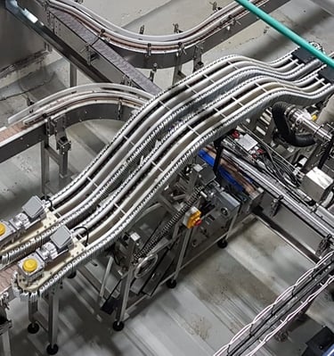 Transportadores de piso, aéreos, elevadores, volteadores, etc.