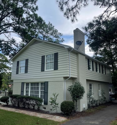 esidential exterior house painting project completed by Garnet Painting & Remodeling in Douglas, GA.
