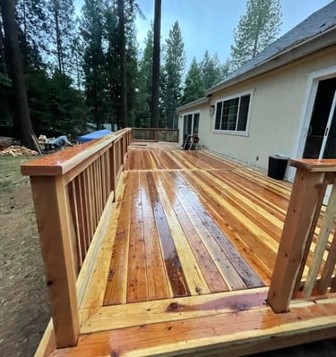 Redwood deck with a polished picture frame boarder 