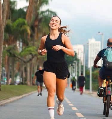 a woman running on a bike and a man riding a bike