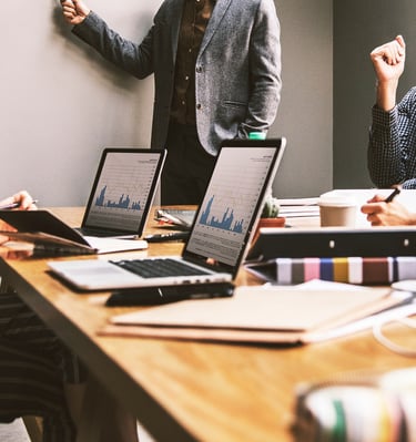 group of people in a business meeting representing gold ira for small businesses