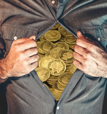 man with chest full of gold coins symbolizing how he is very wealthy and rich investor for gold ira