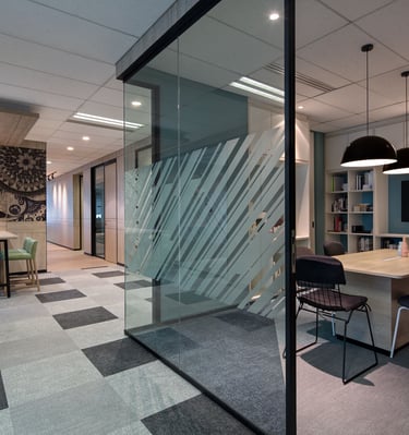 a conference room with a table and chairs