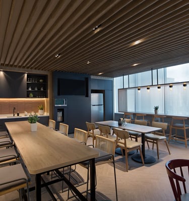 a office room with a table and chairs