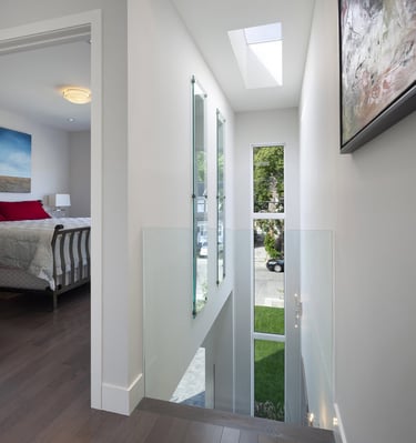 a bedroom with a bed and a bed in the middle of the room