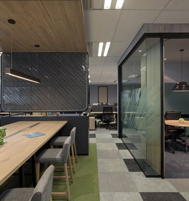 a conference room with a table and chairs
