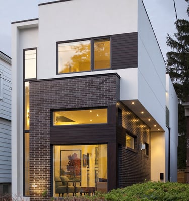 a modern house with a large window and a view of the outside