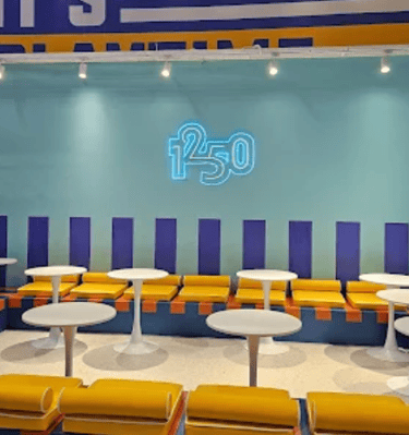 a booth booth with a large number of tables and benches
