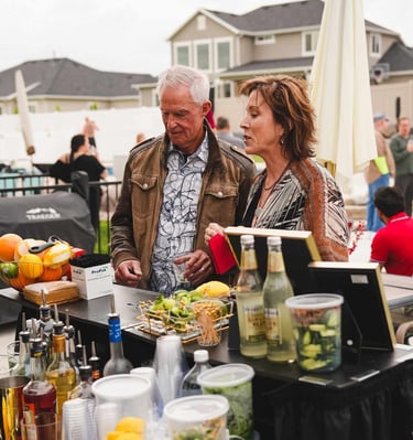 Guests ordering drinks at the bar