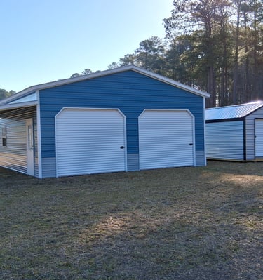 Custom-designed and Custom-built by Pine View Buildings of Moore County Blue Garage. 