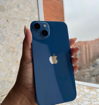 a person holding a blue iphone 11 pro with a blue iphone 11