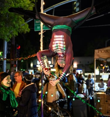 Maury Safari pour elixirs for Aerialogists. Amber Nelson assists. Phot by Jim Sabo