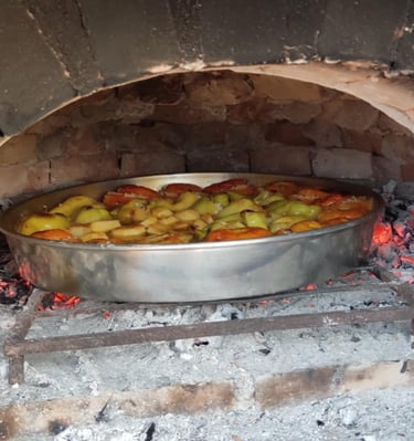 Stuffed Tomatoes & Peppers in the Woodoven by Sunset Drift tavern in Ksamil