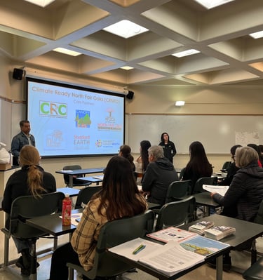 People watching a presentation in a classroom