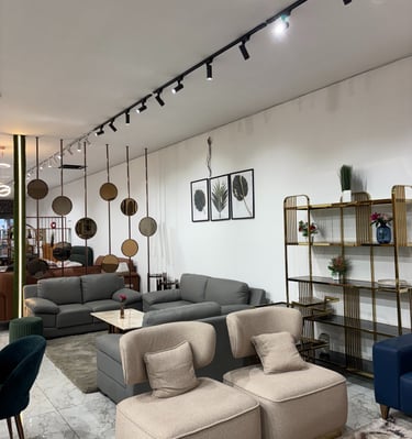 Modern furniture showroom interior in Bengaluru with sofa sets and display shelves