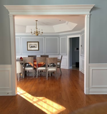 Custom wainscoting and doorway trim in a Monmouth County dining room