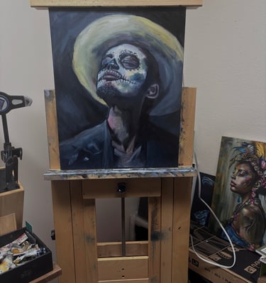 a painting of a man with a hat on a easel
