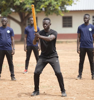 A Smithone Intelligence Ltd security officer demonstrating self-defense training to a group.