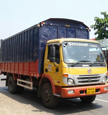 A Tata Ace truck loaded and ready for a short haul delivery on a sunny day.