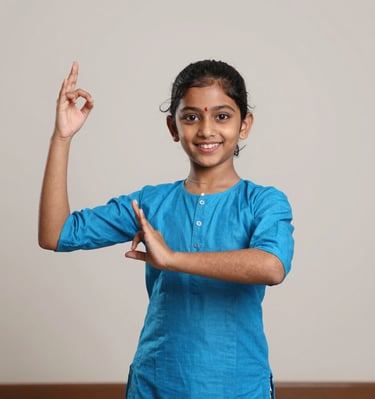 Children sitting in a circle, eagerly watching a storytelling dance demonstration.