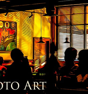 image of bright cafe with people in shadow