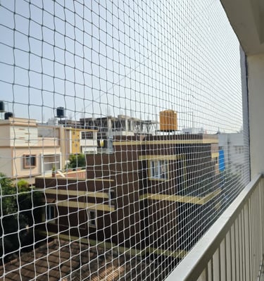 Close-up of the net’s fine mesh texture designed to keep pigeons out while allowing fresh air.
