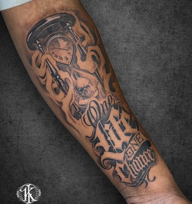 Custom arm tattoo with bold lines and smooth gradients