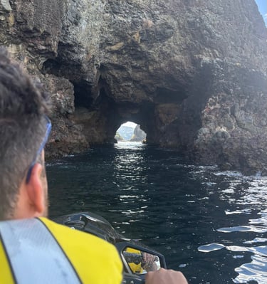 jetski rental riding through a picturesque cave
