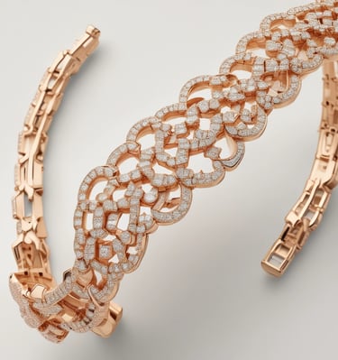 Collection of fine rings in gold and silver arranged artistically on a black surface