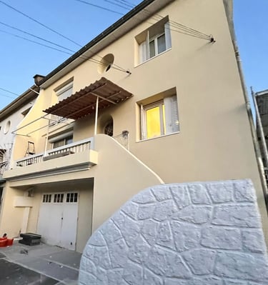 a large white mattress on a building with a large white mattress