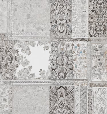 Softly lit studio scene showing a man holding a black than cloth with pride.